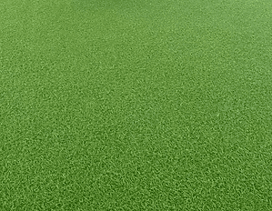 鮮やかな緑色の人工芝のクローズアップ